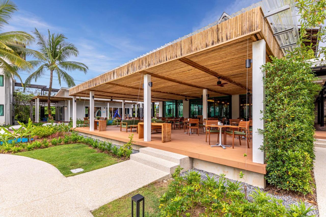 Outrigger Khao Lak Beach Resort - Sha Extra Plus Dış mekan fotoğraf The restaurant at the resort