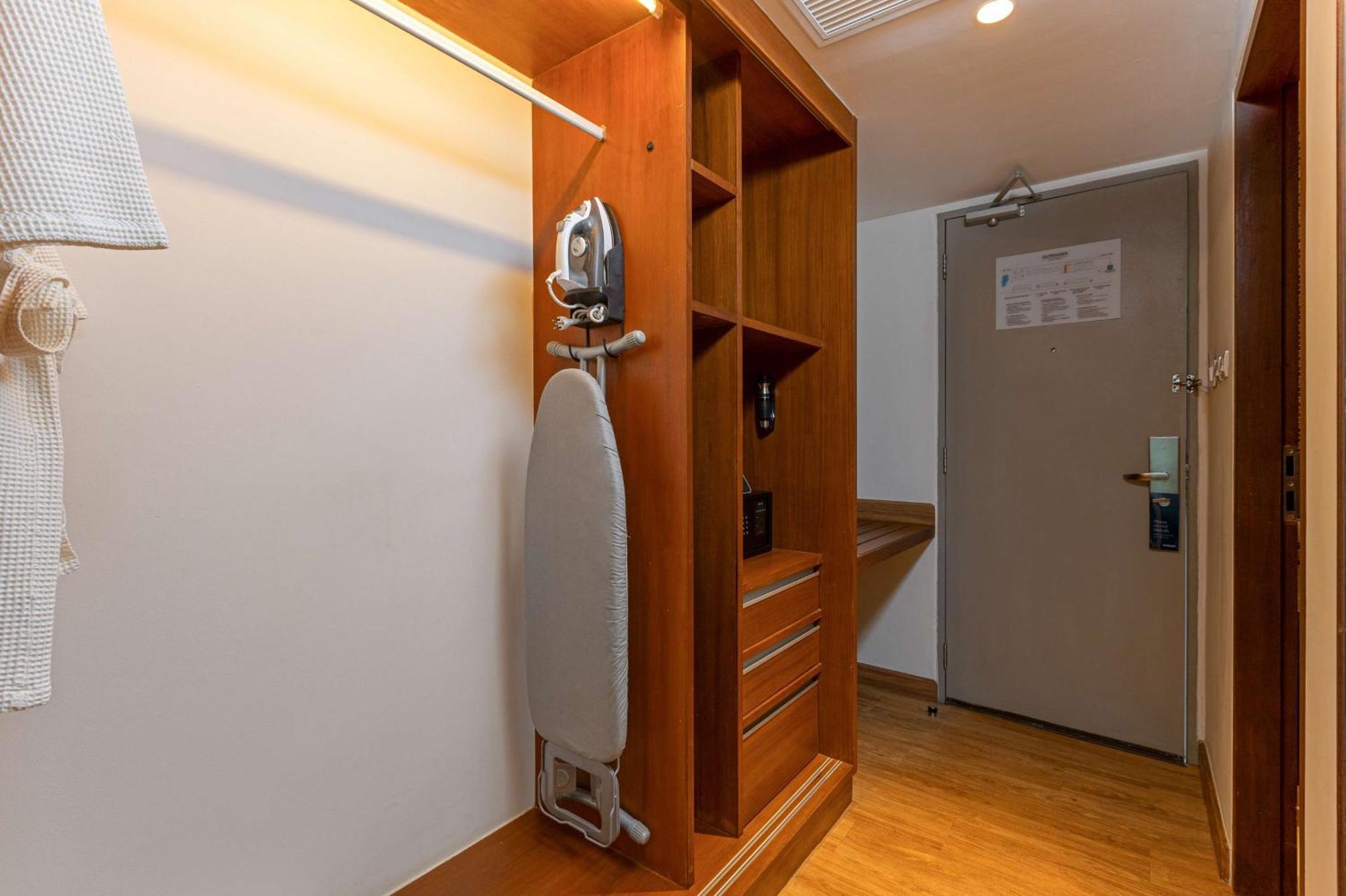 Outrigger Khao Lak Beach Resort - Sha Extra Plus Dış mekan fotoğraf A steam iron and ironing board in a hotel room