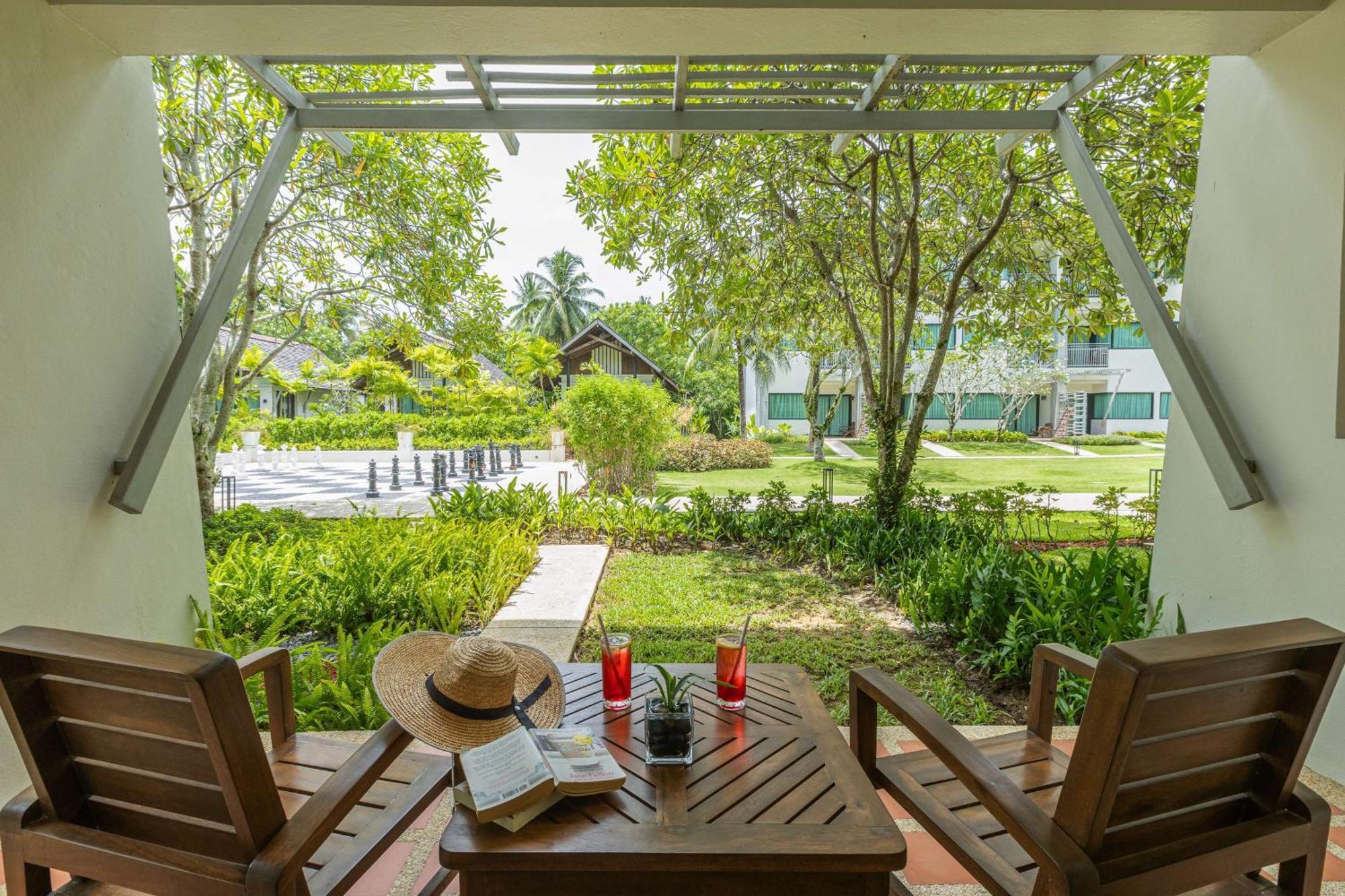 Outrigger Khao Lak Beach Resort - Sha Extra Plus Dış mekan fotoğraf The resort's garden